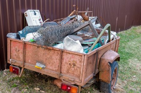 abandoned-garbage-can-field-bulky-metal-waste